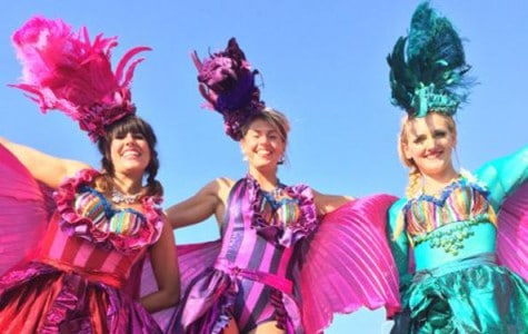 performers dressed in colorful outfits
